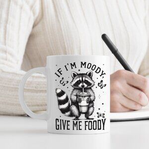 🦝 White Ceramic Mug 11 oz - "If I’m Moody, Give Me Foody" (Funny Design)